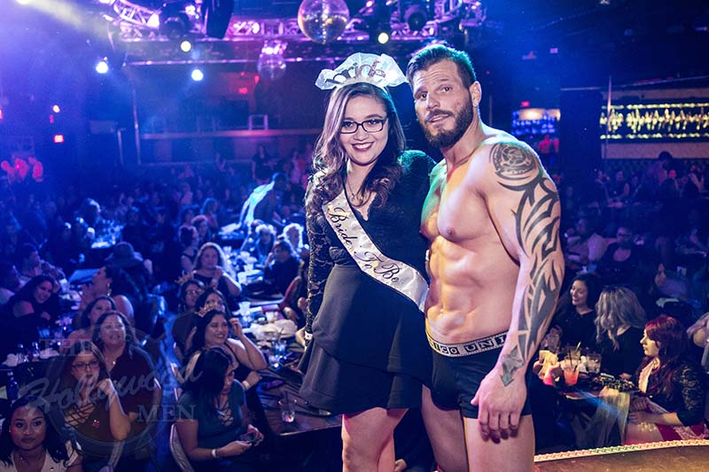 Brian on-stage with bachelorette at The Hollywood Men