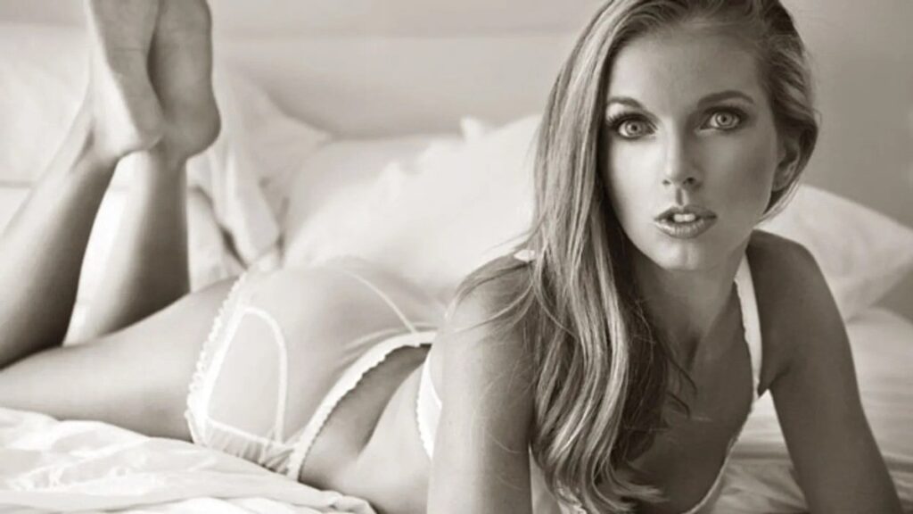 Sienna Sinclaire in lingerie on bed